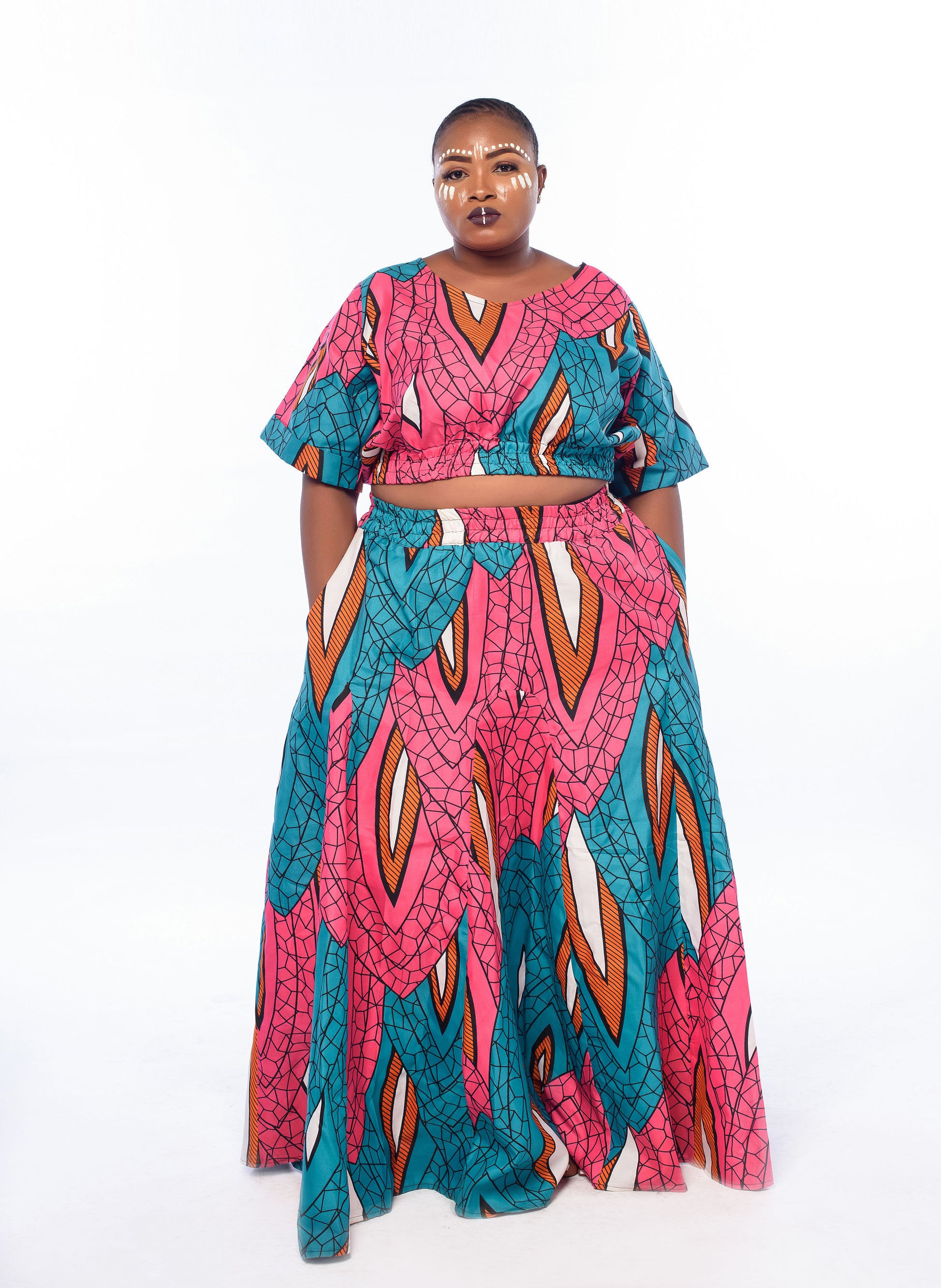 "Chika" is a Nigerian Igbo name which means "God is superior."  Flare maxi skirt with an elastic waistband and pockets.  Handmade and 100% cotton.