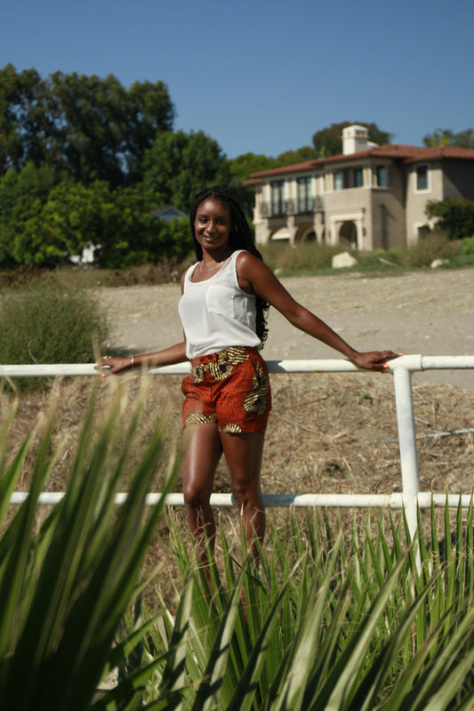 "Chike" is a Nigerian Igbo word meaning "God's power."  Ladies shorts with pockets.  100% cotton.  Note: Runs small; order one size up for a more relaxed fit.
