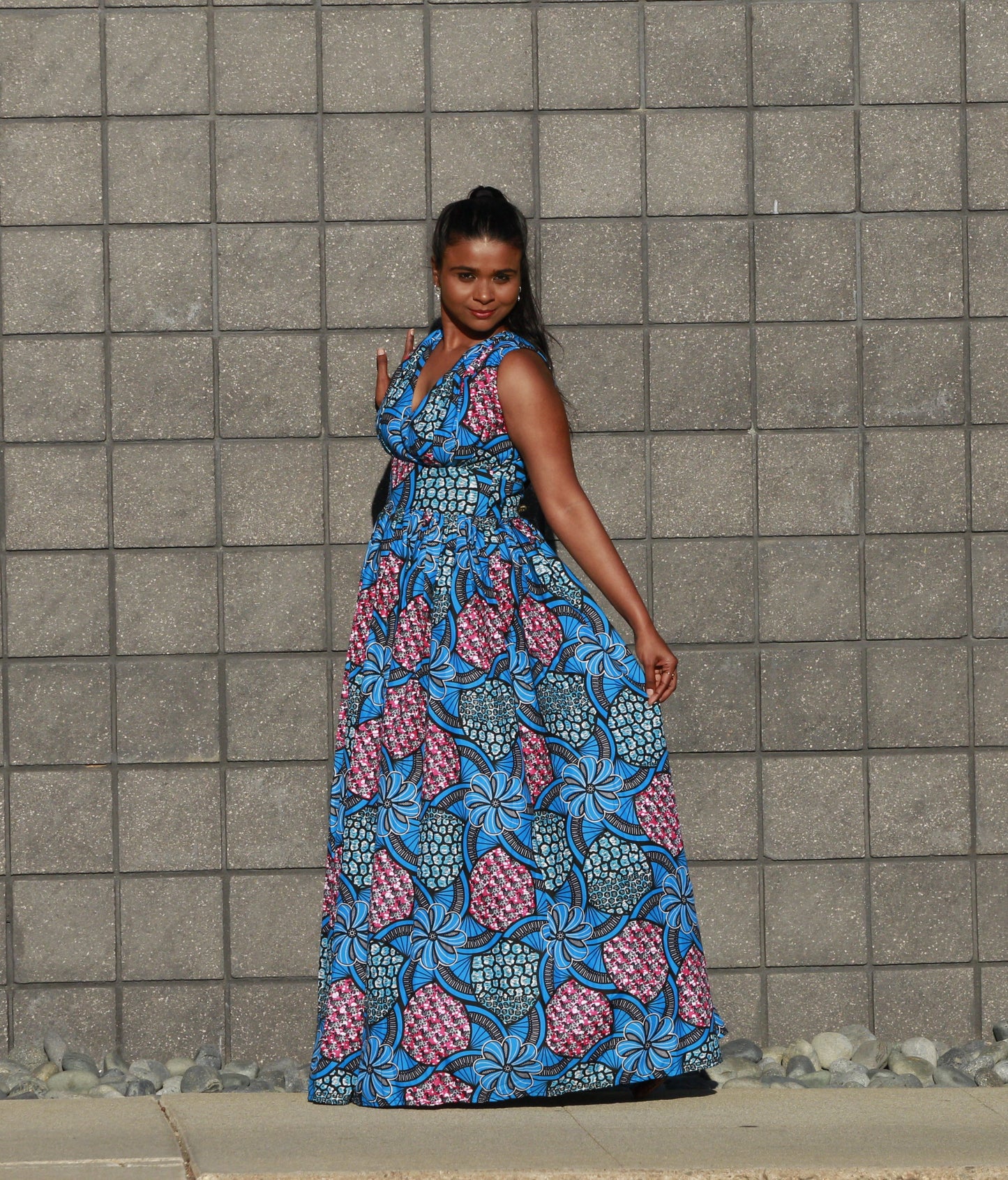 "Ifuru" is the Nigerian Igbo word for "Flower."  Sleeveless, V-neck maxi dress cinched at the waist.  100% cotton.