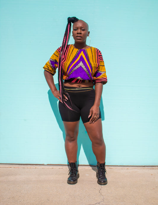 "Nkiru" is a Nigerian Igbo name meaning "the best is still to come."  Short sleeve round neck crop top.  100% cotton.