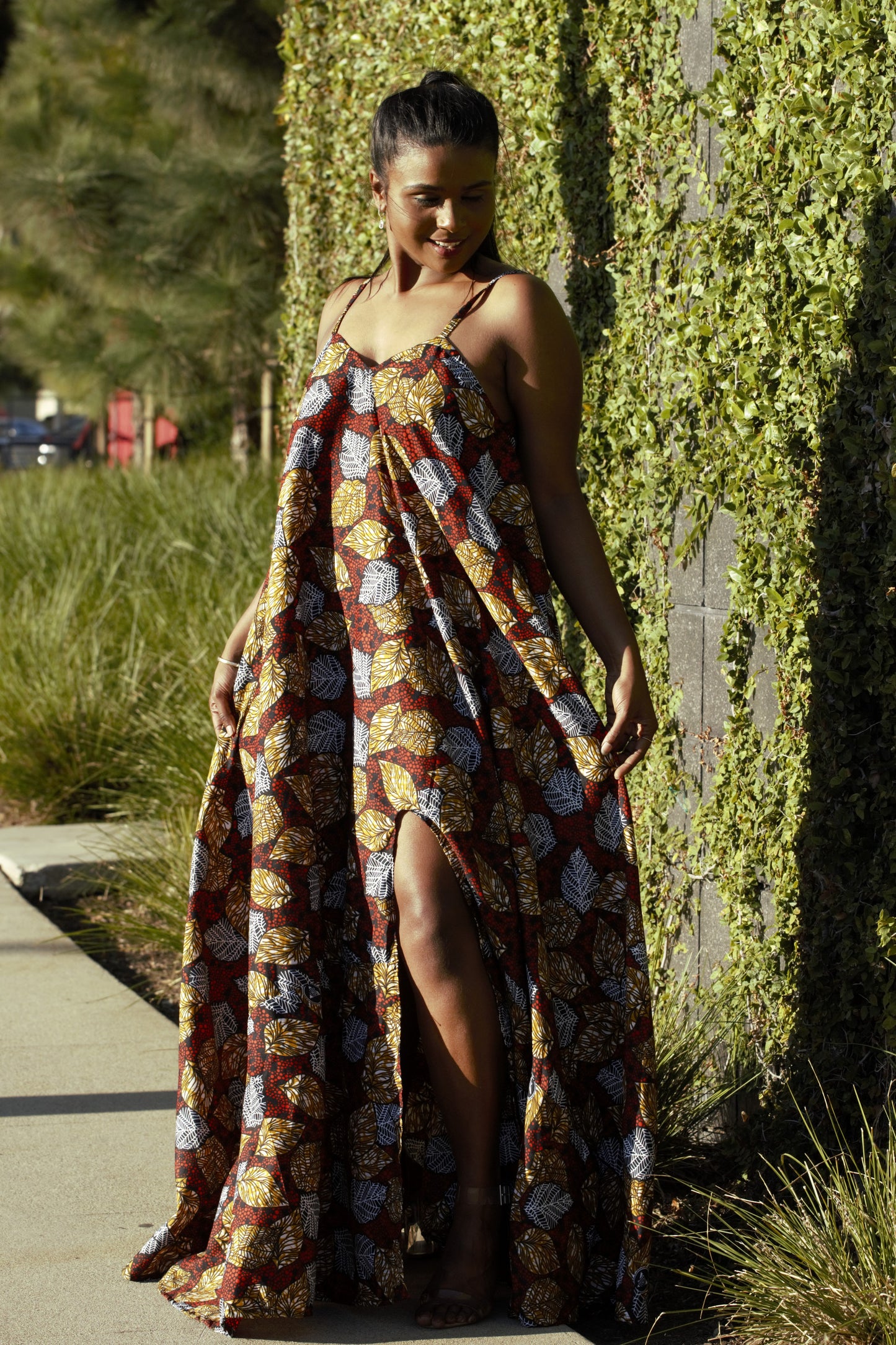 "Nma" is the Nigerian Igbo word for "good."  Oversized Maxi Dress with a v-neck, tieback (that can be worn criss-cross), and a front slit.  100% cotton.